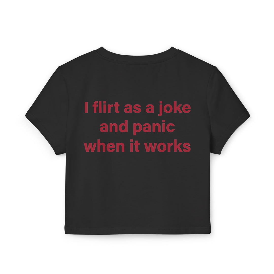 Baby Tee — 'I Flirt as a Joke and Panic When It Works' Funny Graphic Tee